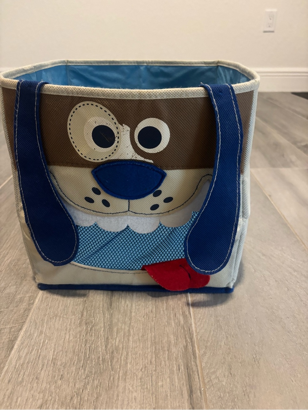 Circo Blue and Brown Dog Face Storage Bin with Red Tongue
